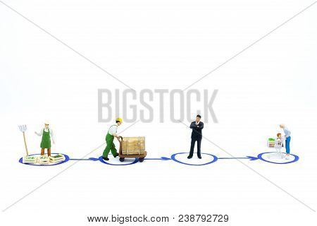 Miniature People: Material Flow Of Product. Image Use For Supply Chain, Business Market Concept.