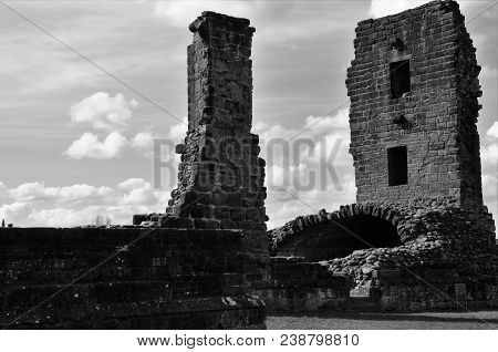 A View Of The Ruins Of The Medieval Red Sandstone Castle In Penrith, Cumbria.