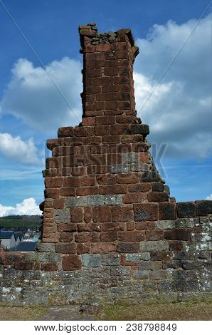 A View Of The Ruins Of The Medieval Red Sandstone Castle In Penrith, Cumbria.