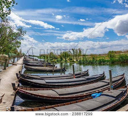 Nature Reserve Of Albufera With Picturesque Wooden Fishing Boats And Pier In Catarroja, Valencia