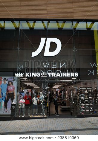 Bracknell, England - April 30, 2018: Staff Open The Entrance Doors Ready For Business At The Jd Spor