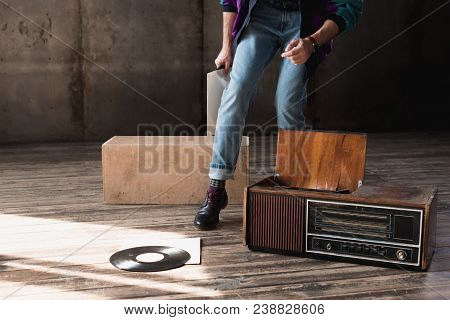 Cropped Shot Of Man In Vintage Windcheater With Vinyl Record Player