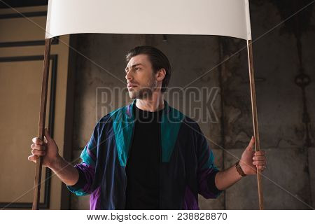 Handsome Young Man In Vintage Windcheater With Blank Placard