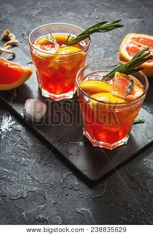 Grapefruit And Rosemary Gin Cocktail, Refreshing Drink With Ice.
