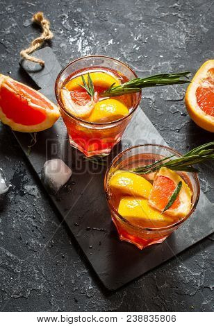 Grapefruit And Rosemary Gin Cocktail, Refreshing Drink With Ice.