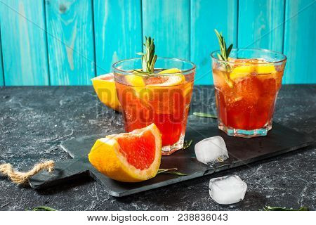 Grapefruit And Rosemary Gin Cocktail, Refreshing Drink With Ice.