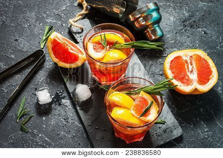 Grapefruit And Rosemary Gin Cocktail, Refreshing Drink With Ice.