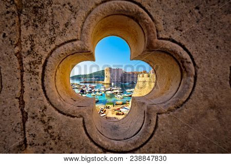 Dubrovnik Harbor View From Ploce Gate Through Stone Carved Detail, Dalamtia Region Of Croatia