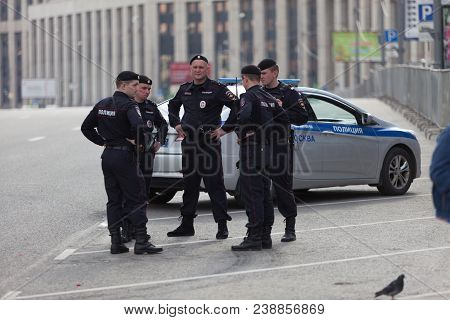Moscow, Russia - April 30, 2018: The Police Cars And Rosgvardia Are Cordoned Off After A Rally On Sa
