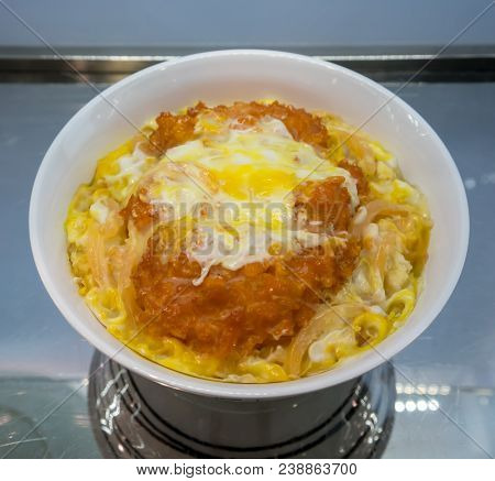 A Look Through Cabinet Mirror Of Japanese Pork Cutlet Katsudon Model For Food Presentation And Shop 