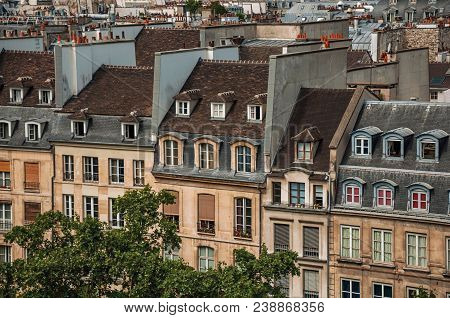 Facade Close-up Of Typical Semidetached Buildings Seen From The Center Georges Pompidou In Paris. Kn