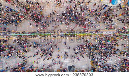People In Songkran Festival At Center Of Sukhothai Province, Aerial View Form Flying Drone