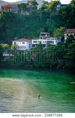 Marapendi Lagoon Seen From Above With Houses On The Hill During Late Afternoon. Barra Da Tijuca, Rio