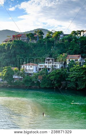 Marapendi Lagoon Seen From Above With Houses On The Hill During Late Afternoon. Barra Da Tijuca, Rio