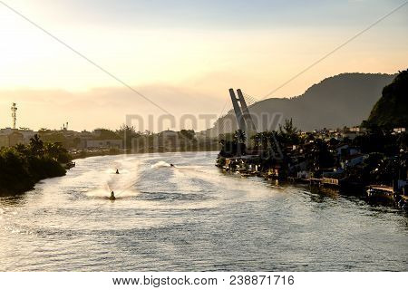 Marapendi Lagoon Seen From Above With Houses On The Hill During Sunset, Golden Light. Jet Skis Are R