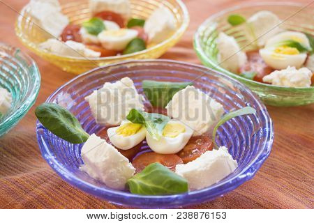 Mixed Appetiser With Spreadable Cheese, Hard Boiled Eggs And Cherry Tomatoes