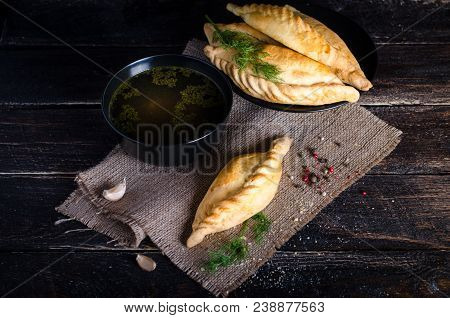 Chicken Broth With Pastries, Mutton And Mushroom Pie. Free Space For Your Text