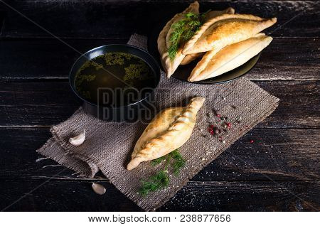 Chicken Broth With Pastries, Mutton And Mushroom Pie. Free Space For Your Text