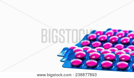 Ibuprofen In Pink Tablet Pills Pack In Blue Blister Pack Isolated On White Background With Copy Spac