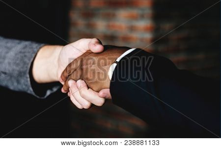 Businessmen shaking hands in a agreeement