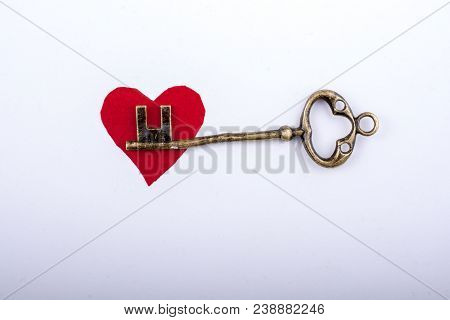 Retro Style Key On A Colorful Background