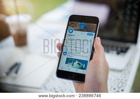 Chiang Mai, Thailand - Mar 07, 2018: Person Holding A Brand New Apple Iphone With Twitter Logo On Th