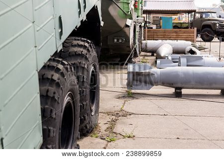 Military Base With Weapons And Heavy Machinery.  Army Naval Post With Air Boms Outdoors. Cold War An