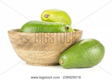 Green Smooth Avocado In A Wooden Bowl Isolated On White Background Ripe Shiny Bacon Variety