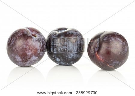 Three Red Blue Plums Isolated On White Background Round Whole Fresh Juicy Fruit