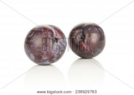 Two Red Blue Plums Isolated On White Background Round Fresh