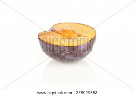 One Red Blue Plum Half Isolated On White Background Cross Section