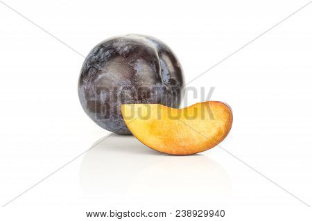 Red Blue Plum And One Slice Isolated On White Background