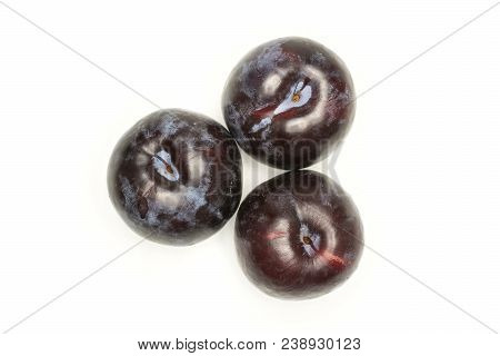 Three Red Blue Plums Top View Isolated On White Background Round Whole Fresh Juicy Fruit