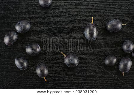 Black Grape Fresh Berries (autumn Royal Variety) Table Top Isolated On Black Wood Background