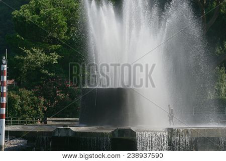 Lake Como: The Fountain Of Villa Geno On A Sunny Day