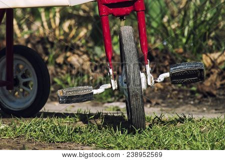 Front Wheel With Pedals. Part Of The Children's Three-wheeled Bicycle Of The Ussr 80S