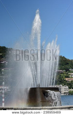 Lake Como: The Fountain Of Villa Geno On A Sunny Day