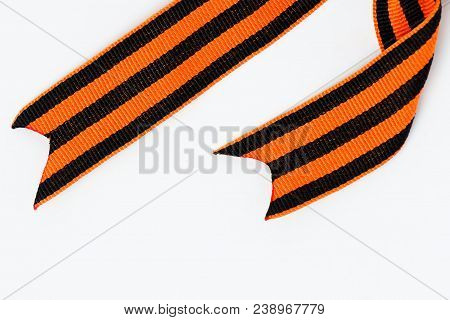 Bant Of Black And Orange Ribbons Of St. George Isolated On White Background