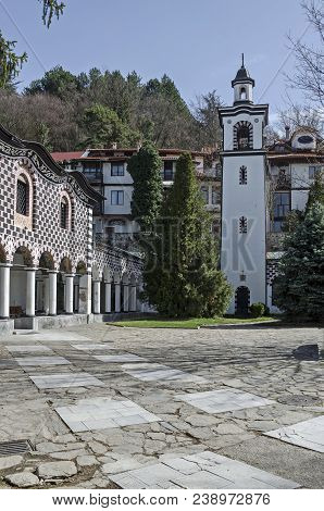 Blagoevgrad, Bulgaria - March 17, 2018: Ancient Residential District, Bell Tower And Church With Aut