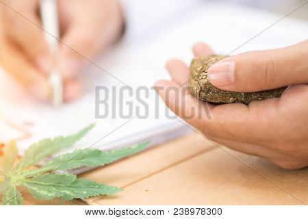 Doctors Write Prescriptions, And Medical Marijuana On A Table Close Up.