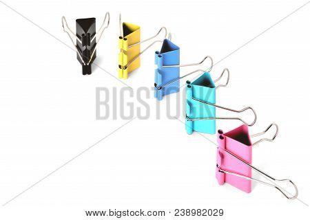Clips For Paper Standing Vertically On A White Background