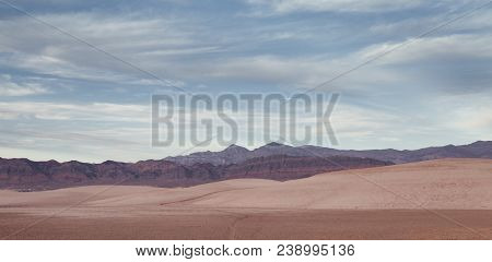 Panoramic View Death Valley With Some Mountains On The Back
