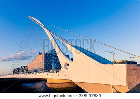 View Of Dublin's Famous Samuel Beckett Bridge Over The River Liffey At Blue Hour