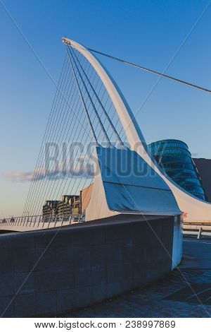 View Of Dublin's Famous Samuel Beckett Bridge Over The River Liffey At Blue Hour