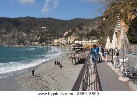 Monterosso, Italy - April 2 2018: The View Of People Walking Along The Sea On Embankment In Monteros