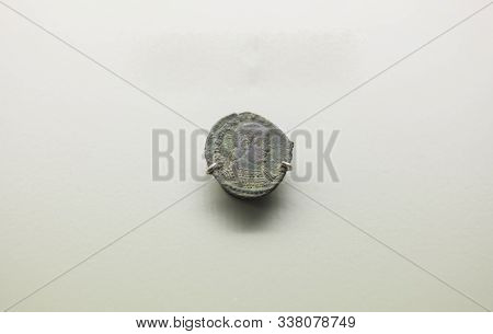 Merida, Spain - August 25th, 2018: Roman Emperor Decentius Bronze Coin. National Museum Of Roman Art