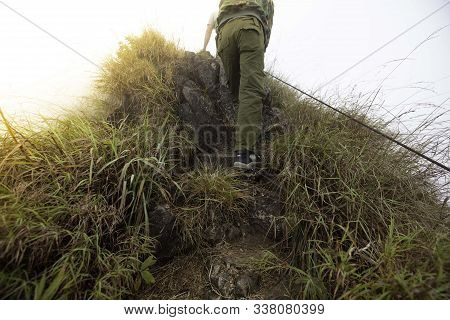 Mountaineer Climb On Top Of Khao Chang Phueak Mountain , Kanchanaburi Province, Thailand