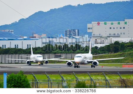 Osaka, Japan - Jun 26, 2019.  Passenger Airplanes Taxiing On Runway Of Osaka Itami Airport (itm). It