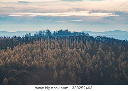 The Ruins Of The Castle Loewenburg On A Hill With Autumnal Forest.