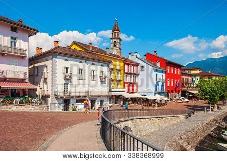 Ascona, Switzerland - July 10, 2019: Port, Church And Colorful Houses Located In Ascona City Near Lo